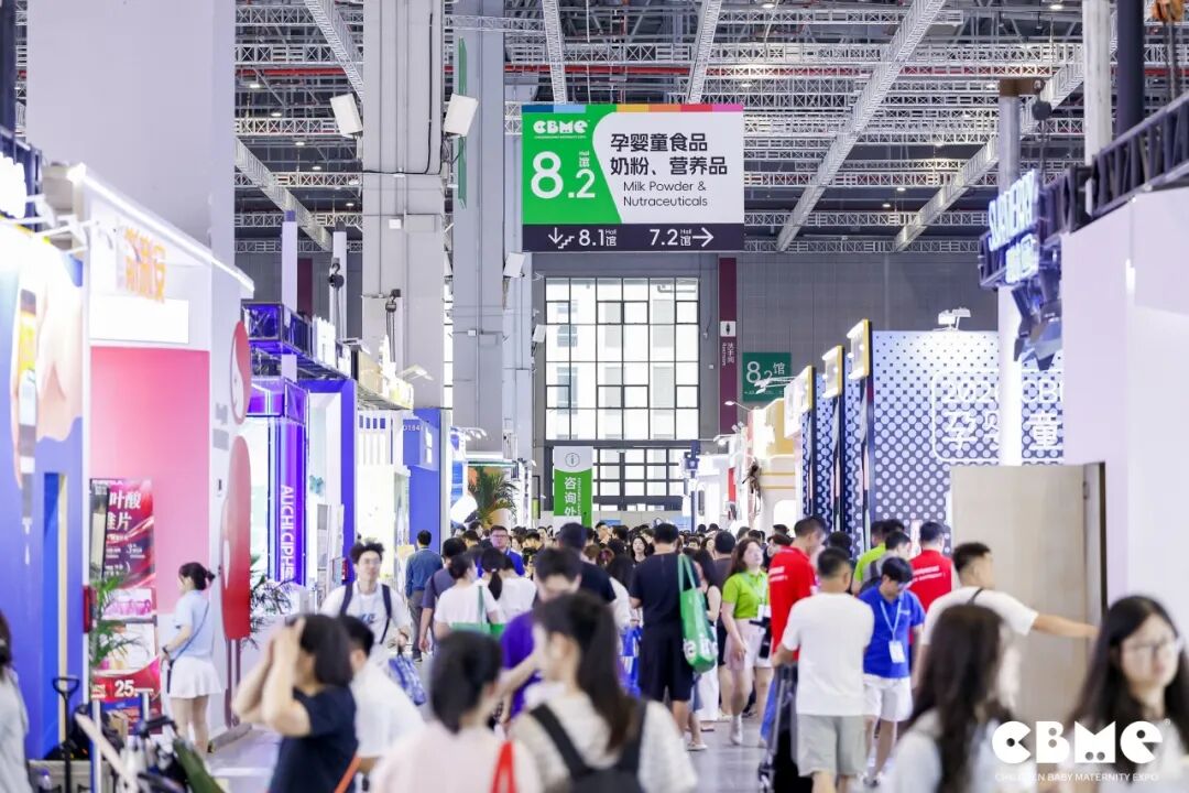 Visitors walking through a CBME exhibition hall